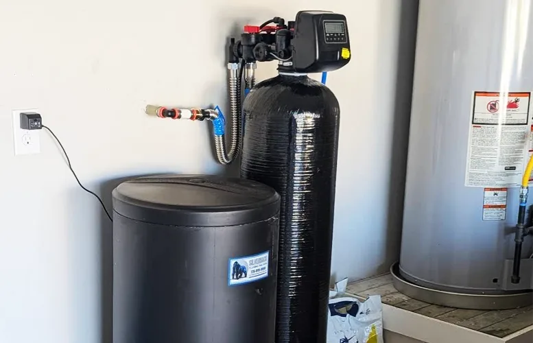 Water softener installed on the main supply line in a San Antonio home