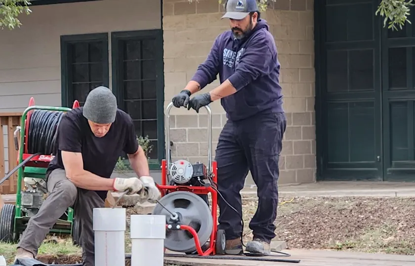 Silverback Plumbing technician completing a repair at a San Antonio home
